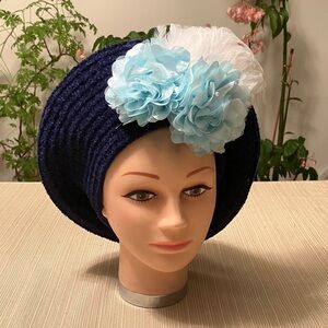 Elegant Navy Blue Chenille Hat with Light Blue Floral Accent and Feather Accent